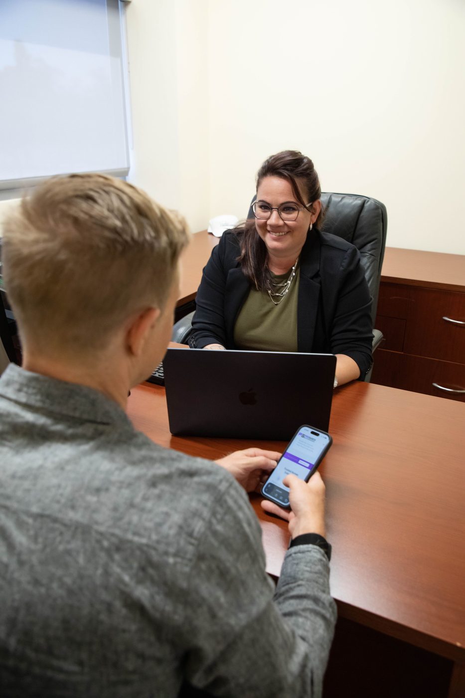 PSBI team members collaborating at a desk